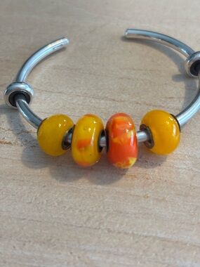 Artisan made glass beads with 925 silver core